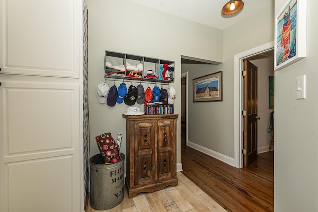 hallway featuring light hardwood / wood-style flooring