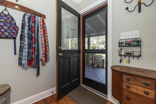 doorway to outside featuring wood-type flooring