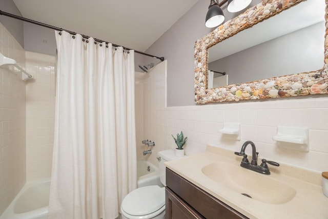 full bathroom with vanity, tile walls, shower / tub combo, and toilet