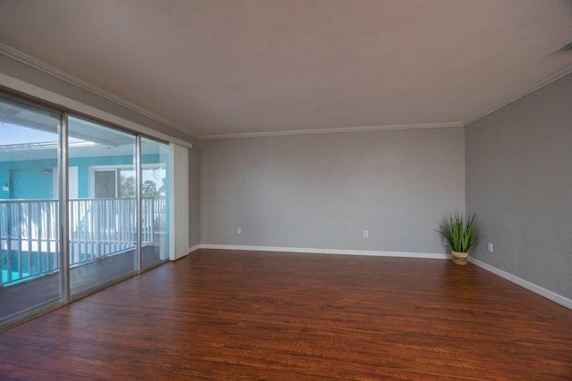 unfurnished room with crown molding and dark hardwood / wood-style flooring