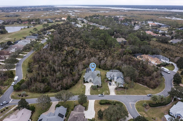 aerial view with a residential view and a water view