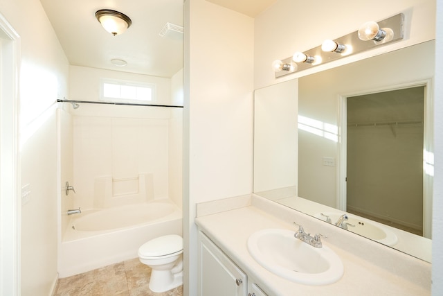 full bathroom featuring vanity, bathing tub / shower combination, and toilet