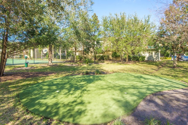 view of yard with tennis court