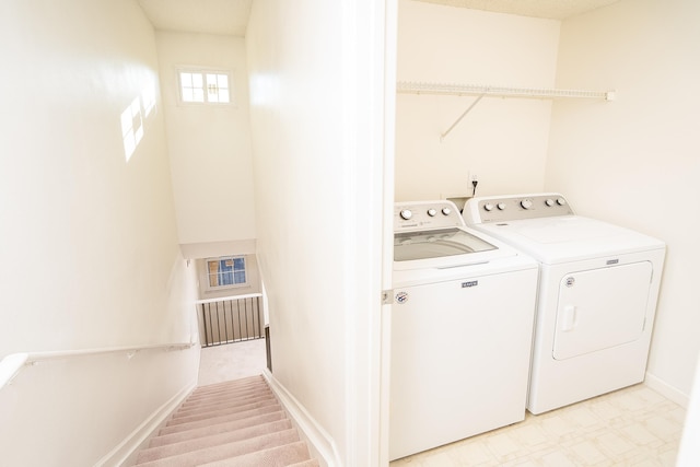 laundry area featuring washing machine and dryer