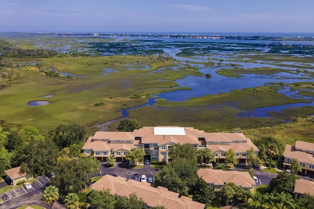 drone / aerial view with a water view