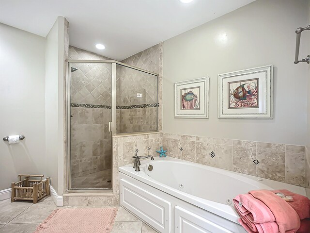 bathroom featuring separate shower and tub and tile patterned floors