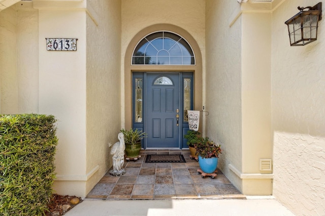 613 Wild Bird Ln, Saint Augustine, FL 32080 - entrance to property with stucco siding