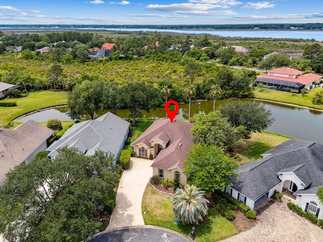 613 Wild Bird Ln, Saint Augustine, FL 32080 - aerial view of residential area with a nearby body of water and a tree filled landscape