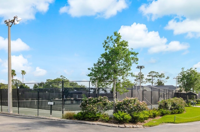 613 Wild Bird Ln, Saint Augustine, FL 32080 - view of tennis court featuring fence