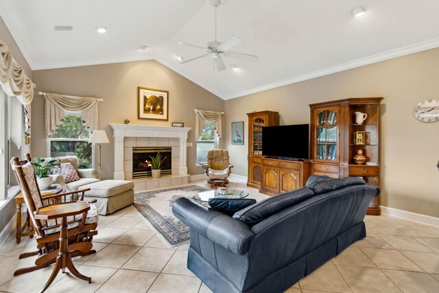 613 Wild Bird Ln, Saint Augustine, FL 32080 - living area with ceiling fan, healthy amount of natural light, light tile patterned floors, lofted ceiling, and crown molding