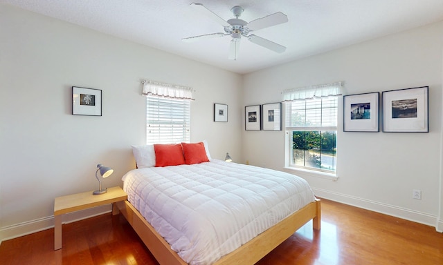 12 Flagler Blvd Unit B201, Saint Augustine, FL 32080 - bedroom with baseboards, wood finished floors, and ceiling fan