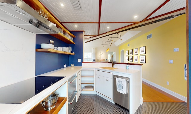 12 Flagler Blvd Unit B201, Saint Augustine, FL 32080 - kitchen with a sink, open shelves, a peninsula, light countertops, and recessed lighting