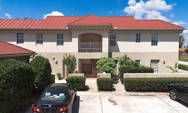 12 Flagler Blvd Unit B201, Saint Augustine, FL 32080 - view of building exterior with uncovered parking