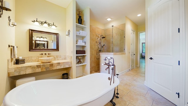 84 Villa Sovana Ct, Saint Johns, FL 32259 - full bathroom with a soaking tub, a walk in shower, vanity, recessed lighting, and built in shelves