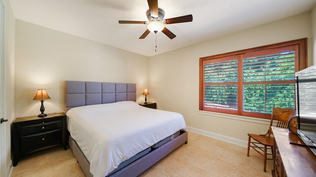 84 Villa Sovana Ct, Saint Johns, FL 32259 - bedroom featuring multiple windows, light tile patterned floors, and a ceiling fan