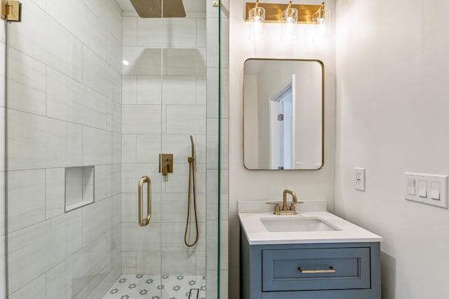 bathroom with vanity and walk in shower