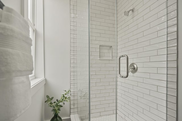 bathroom with an enclosed shower