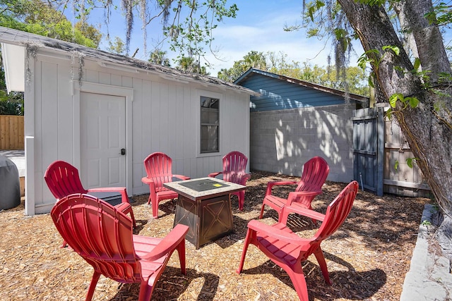 view of patio / terrace with a fire pit