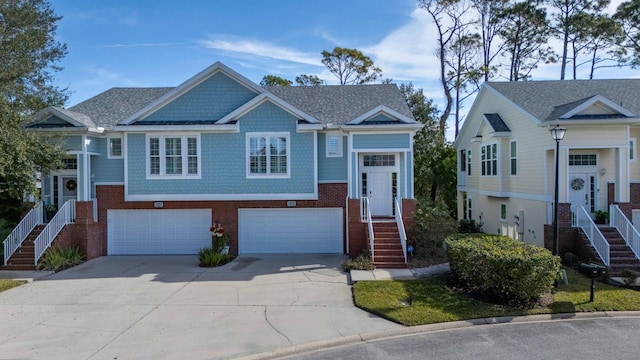 view of front facade with brick siding, concrete driveway, and an attached garage