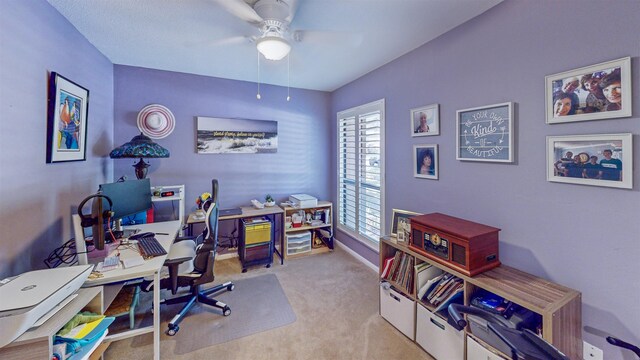 21 Mid Pines Cir Unit 21, Palm Coast, FL 32137 - home office featuring a ceiling fan, carpet flooring, and baseboards