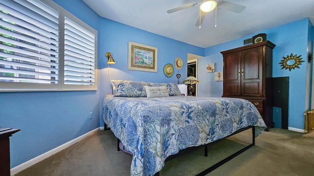 21 Mid Pines Cir Unit 21, Palm Coast, FL 32137 - carpeted bedroom featuring baseboards and a ceiling fan