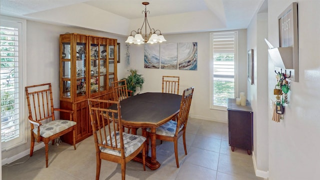 21 Mid Pines Cir Unit 21, Palm Coast, FL 32137 - dining area featuring a chandelier, plenty of natural light, and baseboards