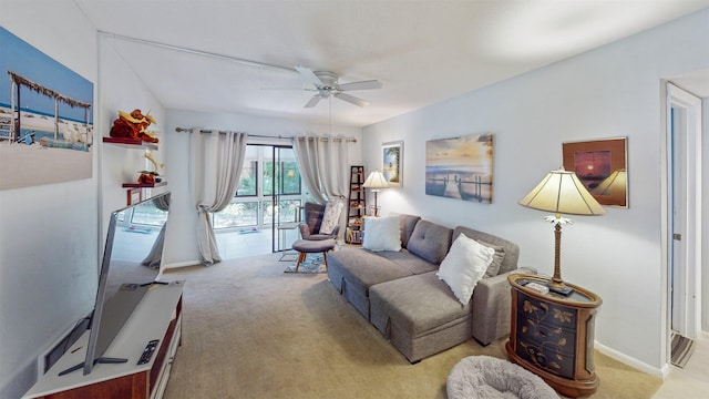 21 Mid Pines Cir Unit 21, Palm Coast, FL 32137 - carpeted living area featuring ceiling fan and baseboards