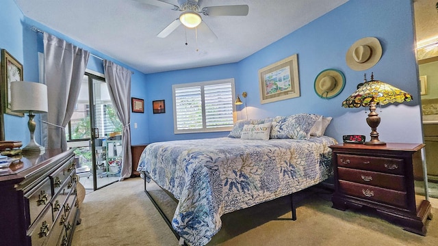21 Mid Pines Cir Unit 21, Palm Coast, FL 32137 - bedroom with carpet floors and a ceiling fan