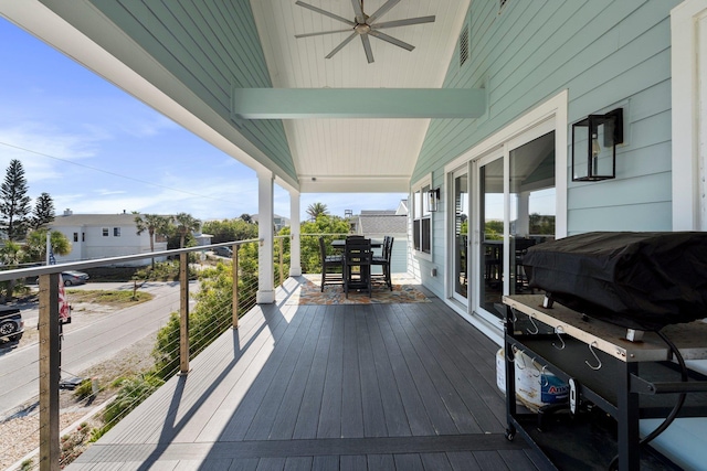 wooden deck with ceiling fan