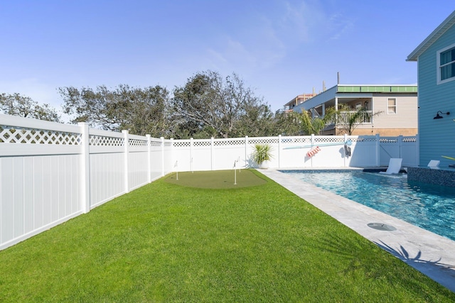 view of yard featuring a fenced backyard and a fenced in pool