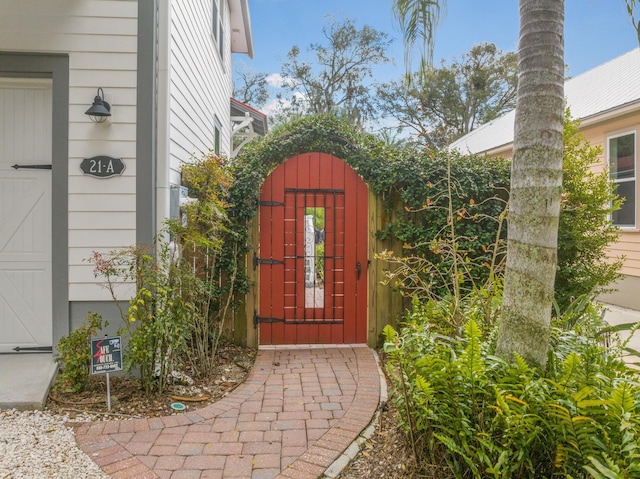 view of exterior entry featuring a gate