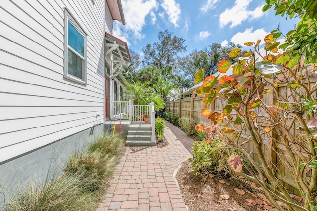 view of patio featuring fence