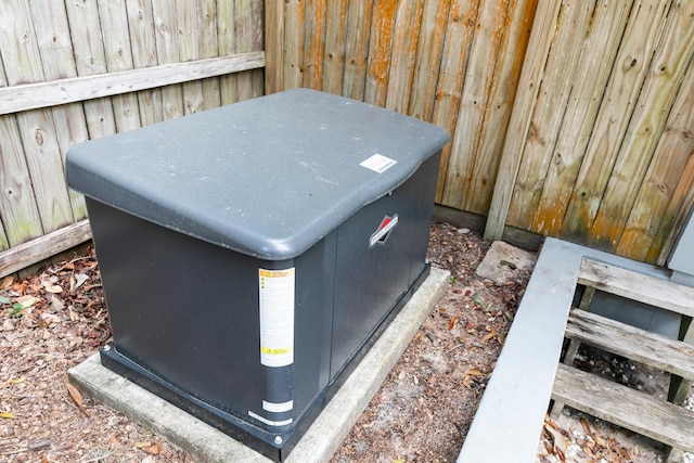 exterior details with fence and a power unit