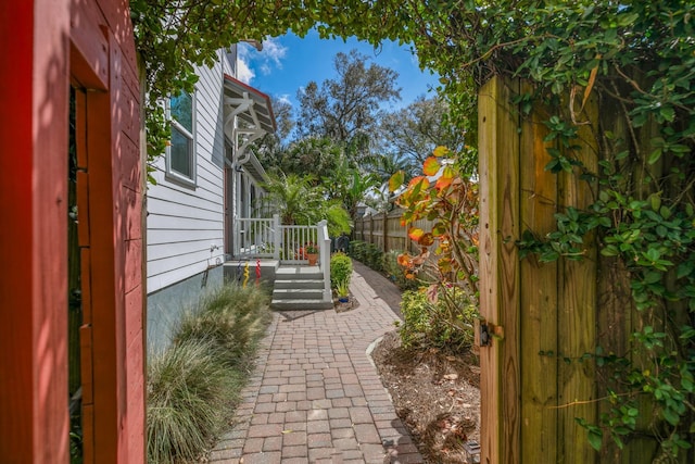 view of patio featuring fence