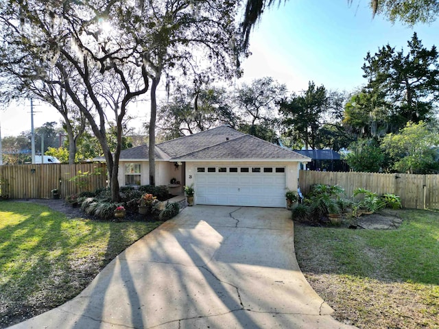 single story home featuring a garage, fence, concrete driveway, and stucco siding