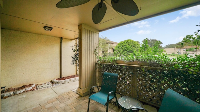 balcony featuring ceiling fan