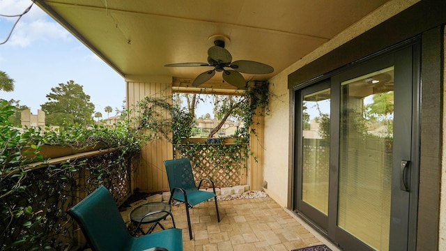 balcony featuring ceiling fan