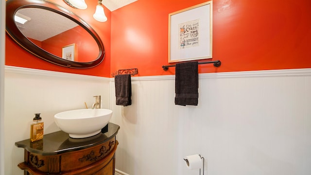 bathroom featuring vanity and a textured ceiling