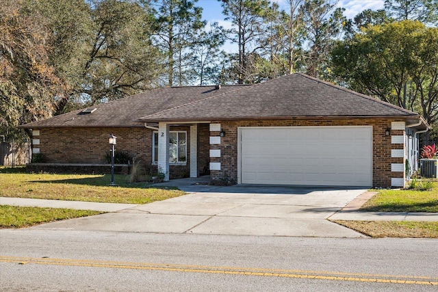 single story home with a front yard, a garage, and central AC unit