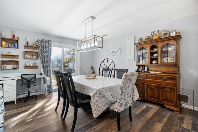 dining room featuring dark hardwood / wood-style floors