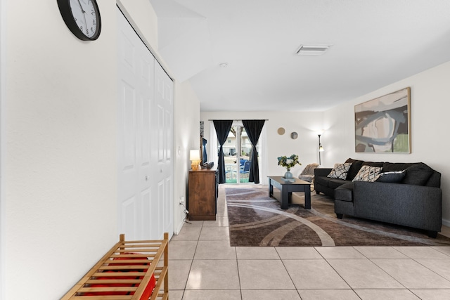 living room featuring light tile patterned floors