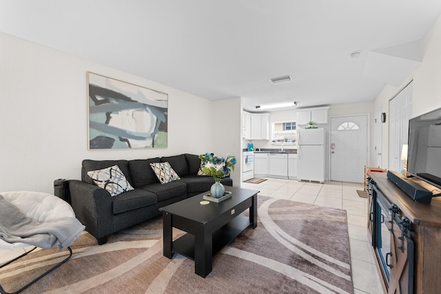 living room featuring light tile patterned floors