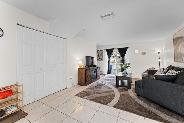 living room with light tile patterned flooring