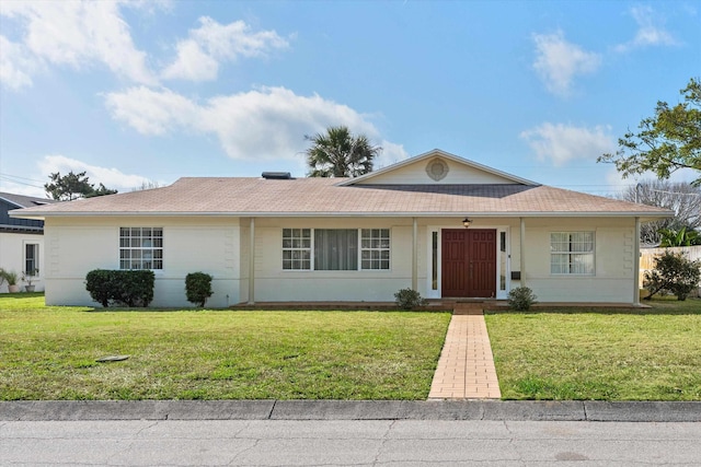 ranch-style home with a front yard