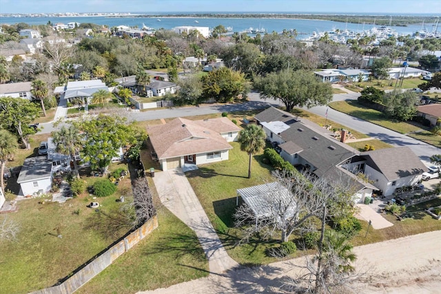 drone / aerial view with a water view