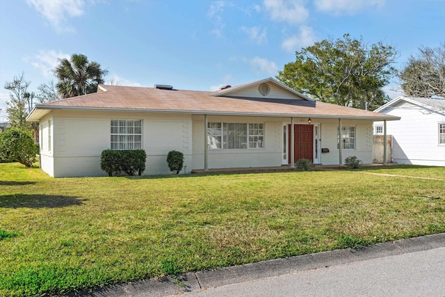 ranch-style home with a front yard