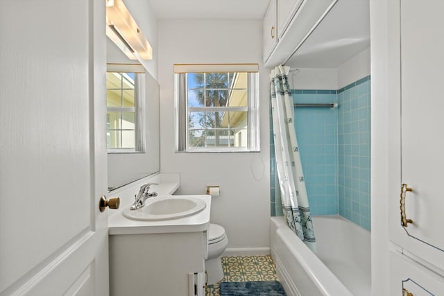 full bathroom with toilet, vanity, and shower / bathtub combination with curtain