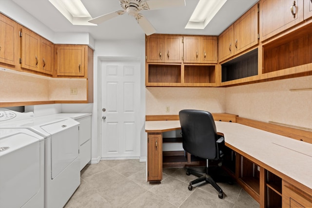 office with light tile patterned flooring, ceiling fan, separate washer and dryer, and built in desk