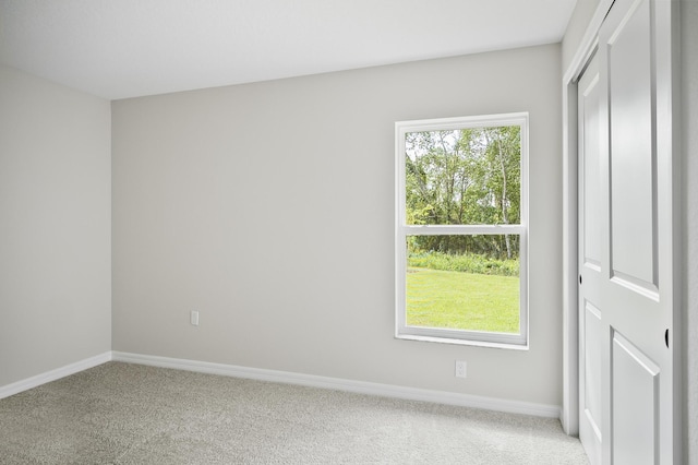 view of carpeted spare room