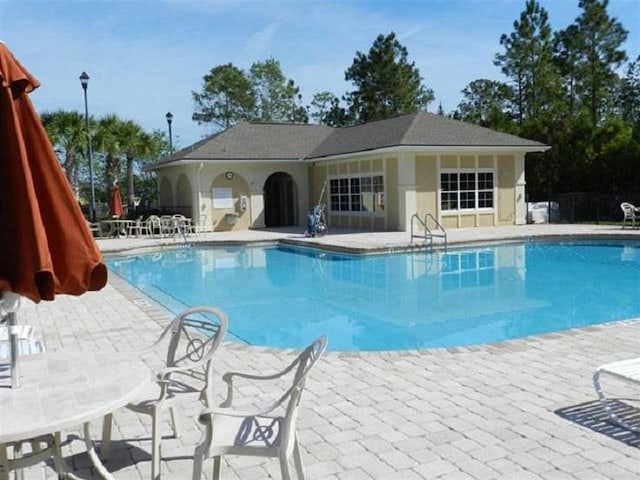 2550 Golden Lake Loop, Saint Augustine, FL 32084 - community pool with a patio area